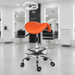Ergonomische Kapperskruk met voetring - Oranje - KS Medical Group