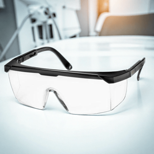 Veiligheidsbril voor laserklinieken naast een ipl machine voor laser ontharing met ultrasound gel 